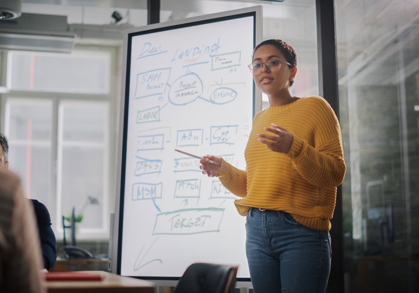 Strategy and content marketing presentation in a modern office setting.